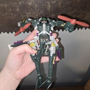 Green Transforming Robot Toy with Red Propellers - Kids Toy